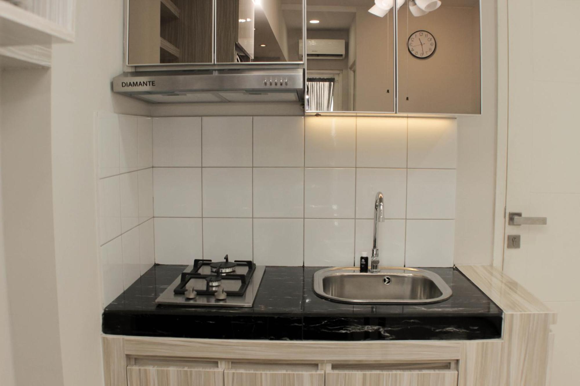 Cozy 2br Springlake Summarecon By Travelio
