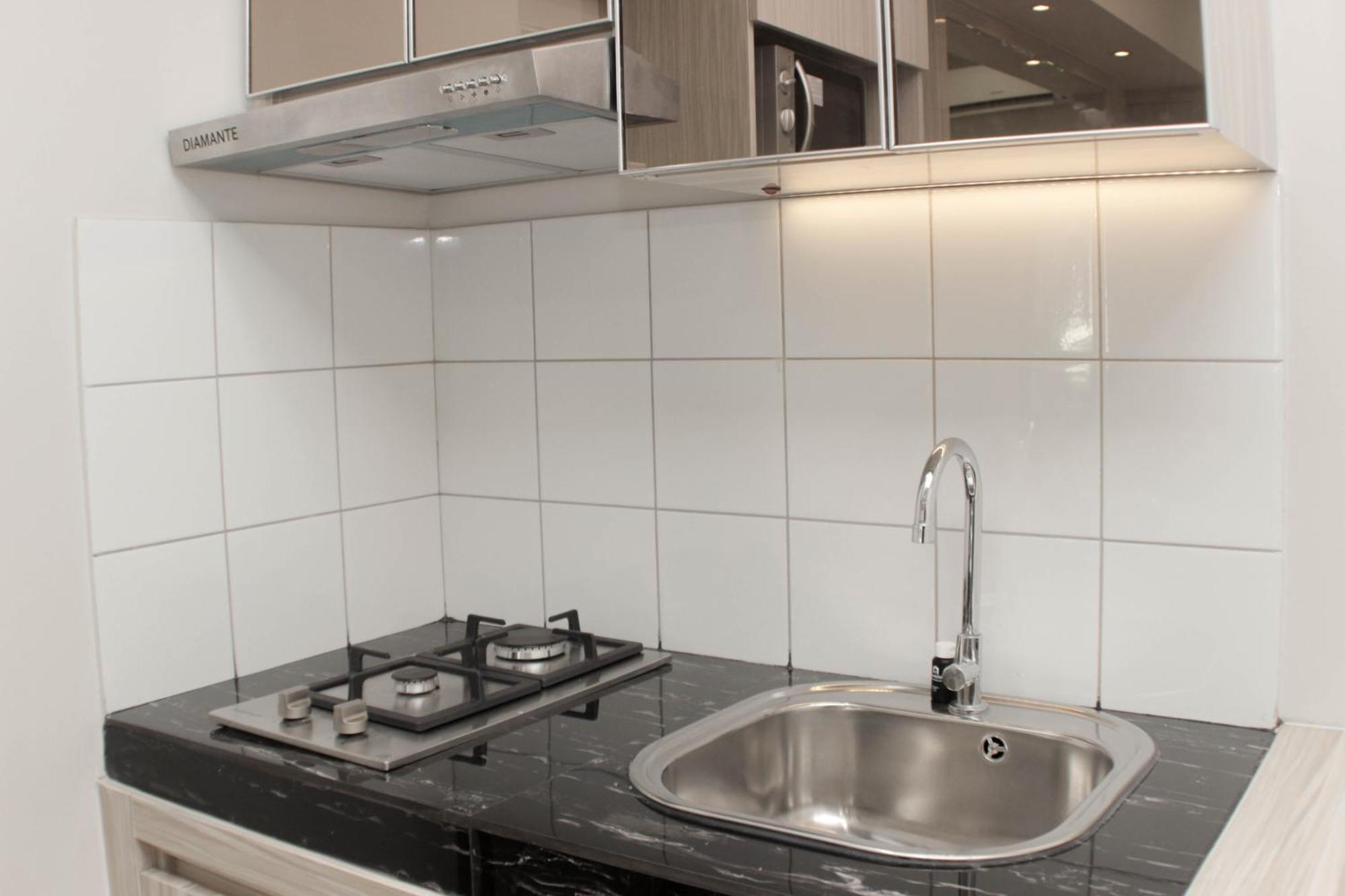 Apartemen Cozy 2br Springlake Summarecon By Travelio