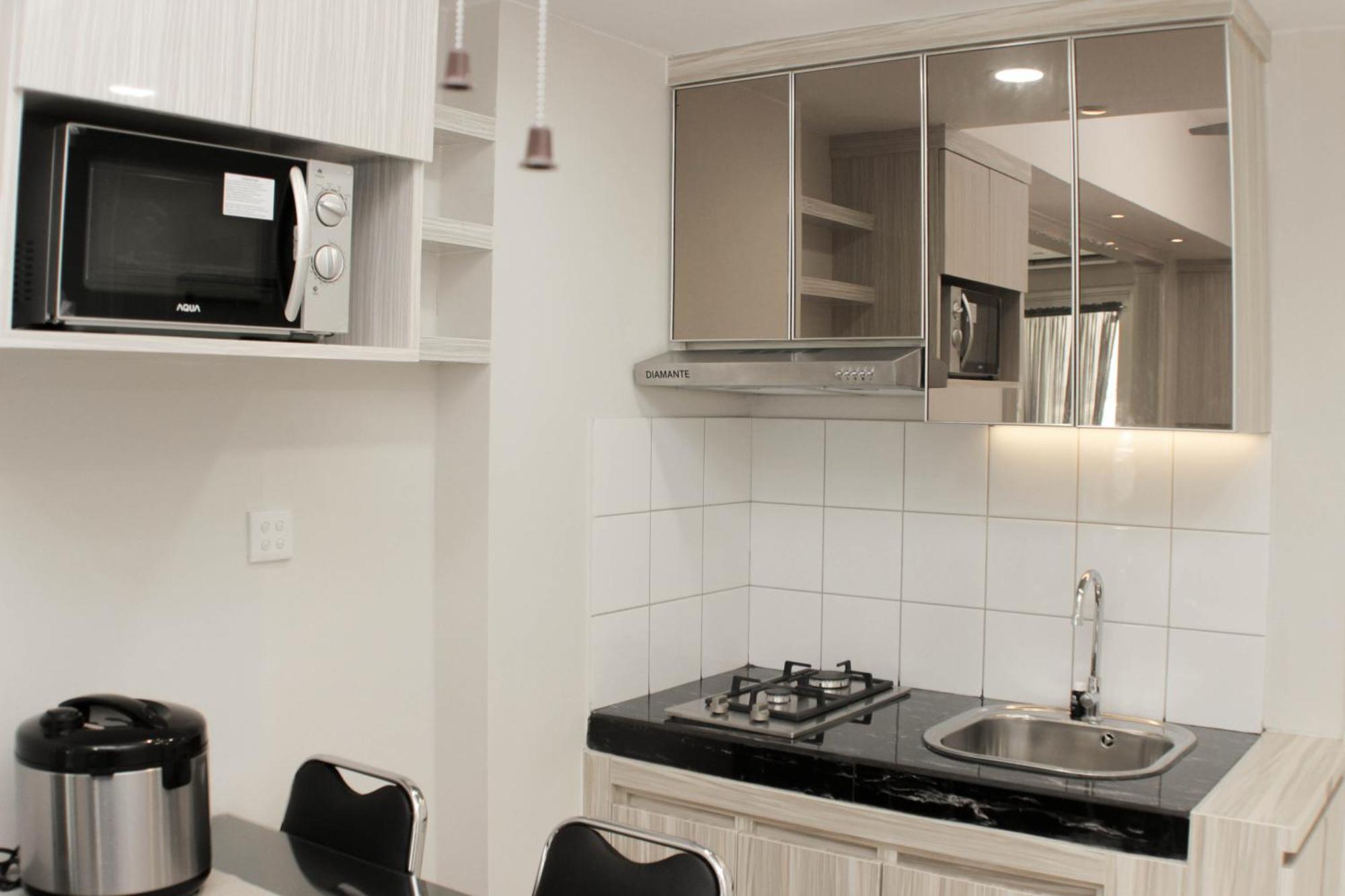 Cozy 2br Springlake Summarecon By Travelio Apartemen